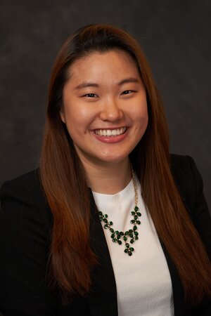 portrait photo of Katherine Kwak against a grey background