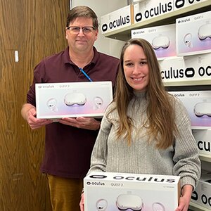 photo of Randall Sadler and Tricia Thrasher with Meta's VR headsets